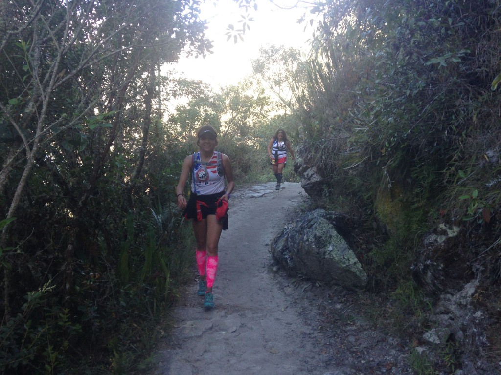 runners on inca trail near sun gate